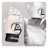 Akadema batting glove in white with grey accents, showing palm grip surface