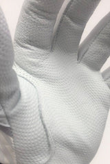 Akadema batting glove in white showing palm grip surface