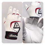 Akadema batting glove in white with wine accents, showing palm grip surface